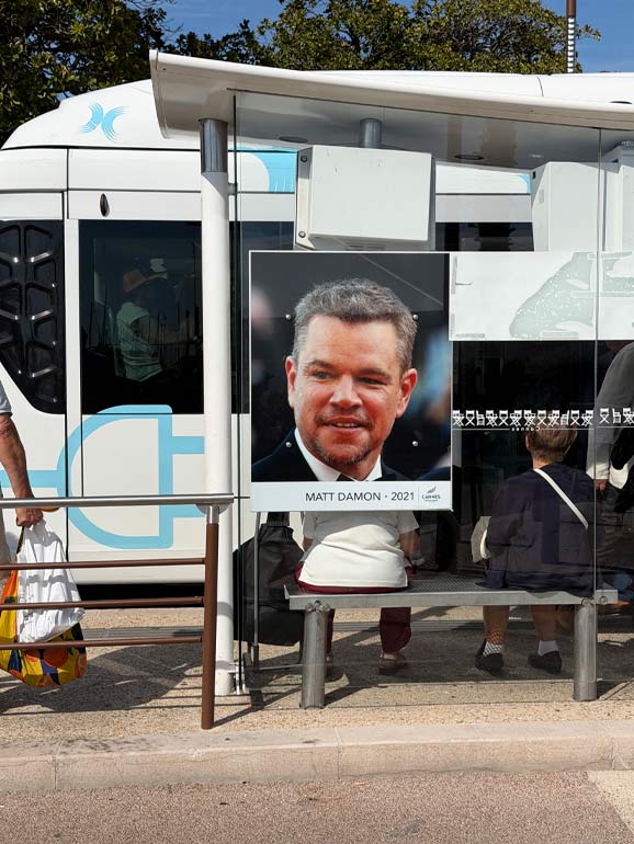 2021 Cannes Promotional Poster Promotional Poster at a bus-stop with Matt Damon on it.