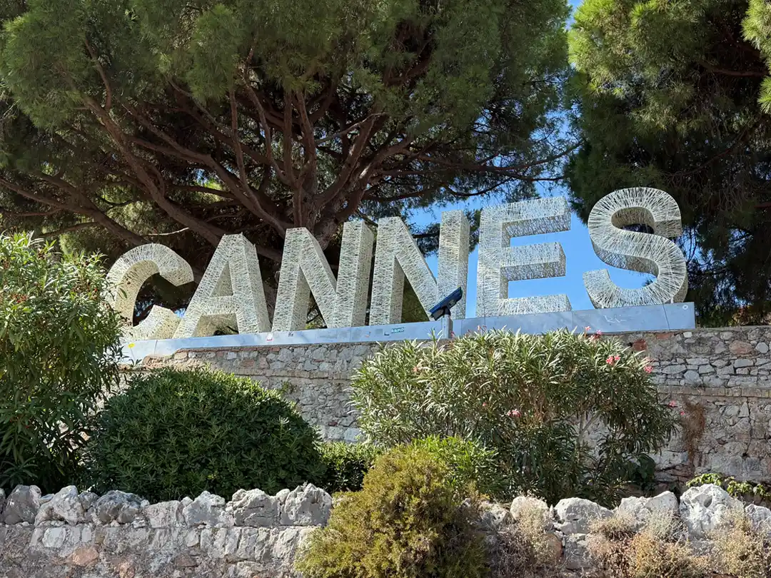CannesPageHeader Large white Cannes sign at the top of Le Suquet hill