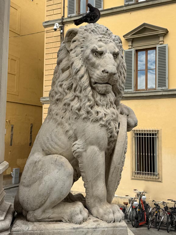 Large white lion statue.
