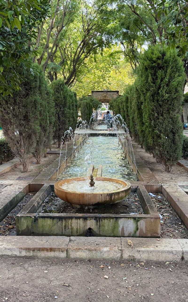 Palma Fountain Jardines de S'Hort de Rei fountain with water in it.