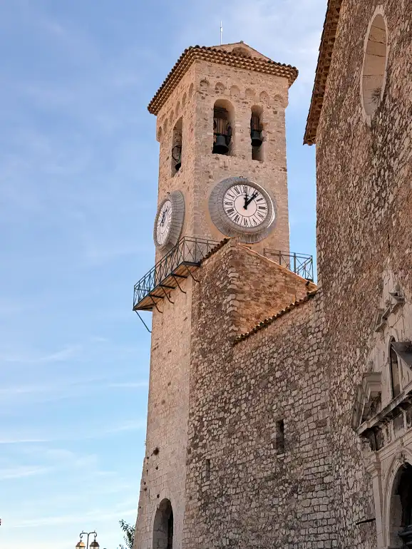 Place de la Castre Clock Tower A large clock on a tower.