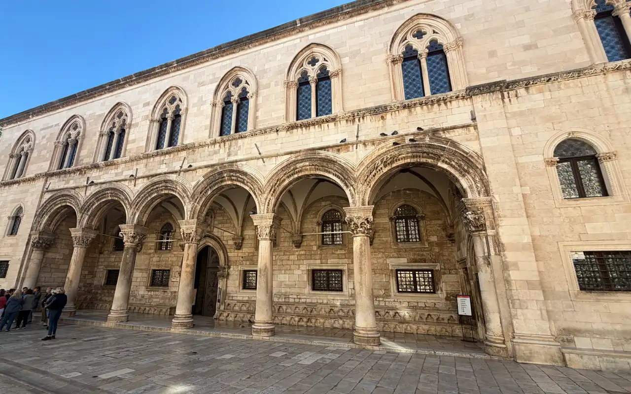 Looking at Rector's Palace with archways and columns.