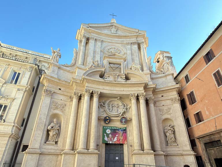San Marcello al Corso church with cross on top. Photo taken from the Via del Corso (Cardo Maximus of Rome)