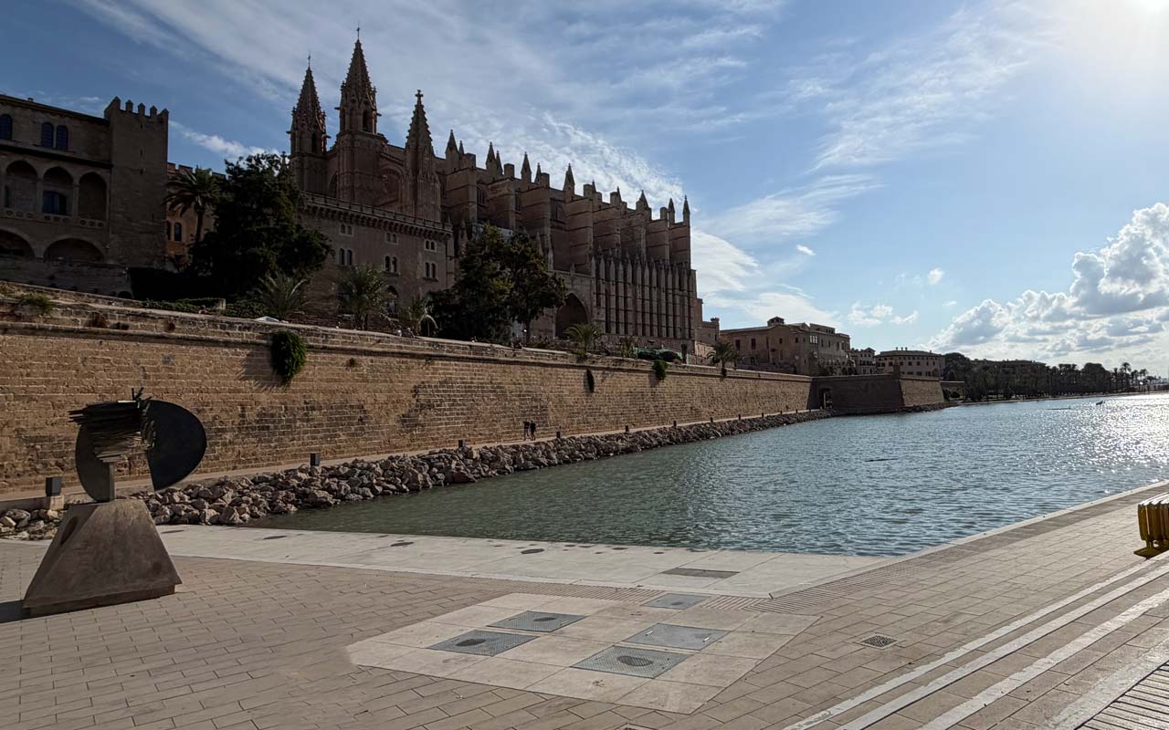 Walking around Palma Cathedral Looking at the Parc de la Mar with the Palma Cathedral in the background.