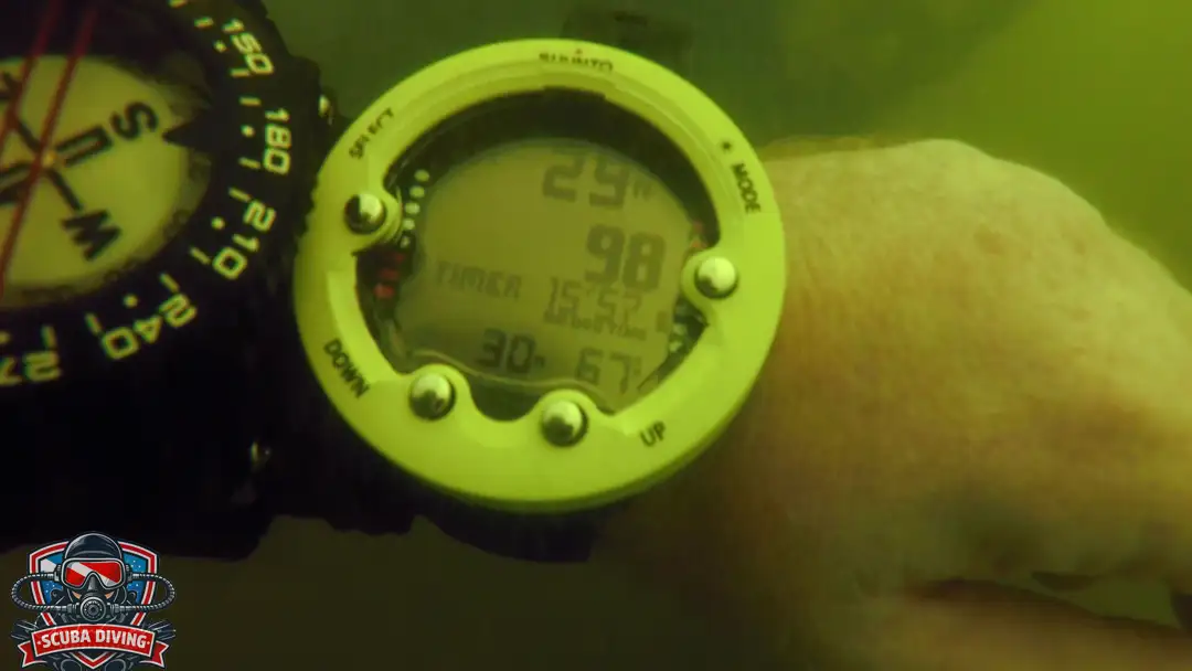 Diving Compass and watch in green murky water