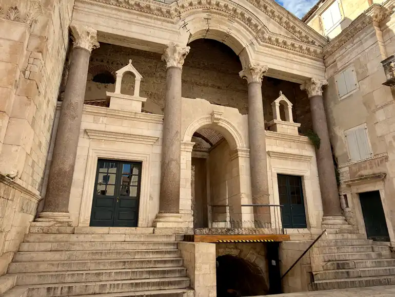 The southern terminus of the Diocletian's Palace Click to open side panel for more information grid, right at the entrance to the Peristyle.